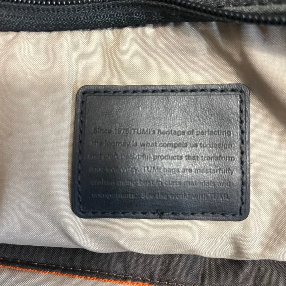 Tumi adjustable backpack